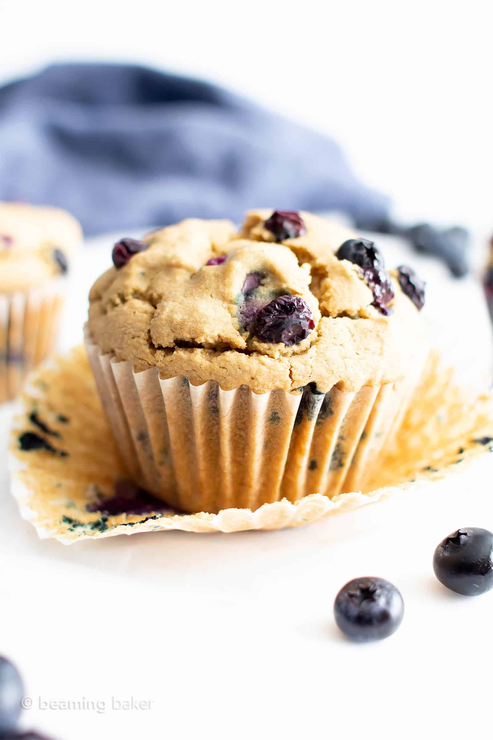 Healthy Vegan Gluten Free Blueberry Muffins: my favorite vegan gluten free blueberry muffins are easy ‘n moist! The best healthy blueberry muffin recipe—made with oat flour and healthy ingredients! #Healthy #Muffins #Vegan #GlutenFree #Blueberry | Recipe at BeamingBaker.com