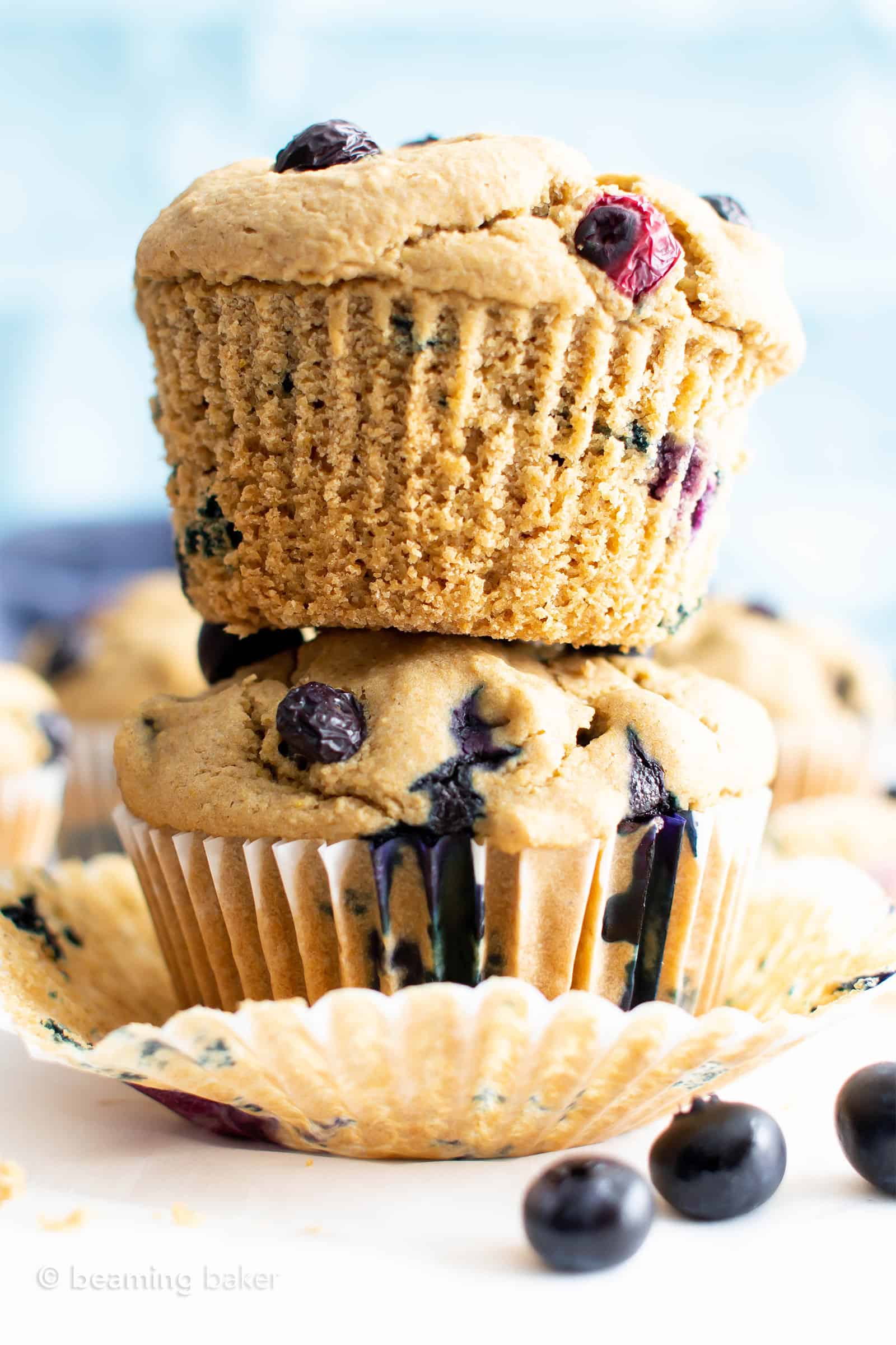 Healthy Vegan Gluten Free Blueberry Muffins: my favorite vegan gluten free blueberry muffins are easy ‘n moist! The best healthy blueberry muffin recipe—made with oat flour and healthy ingredients! #Healthy #Muffins #Vegan #GlutenFree #Blueberry | Recipe at BeamingBaker.com