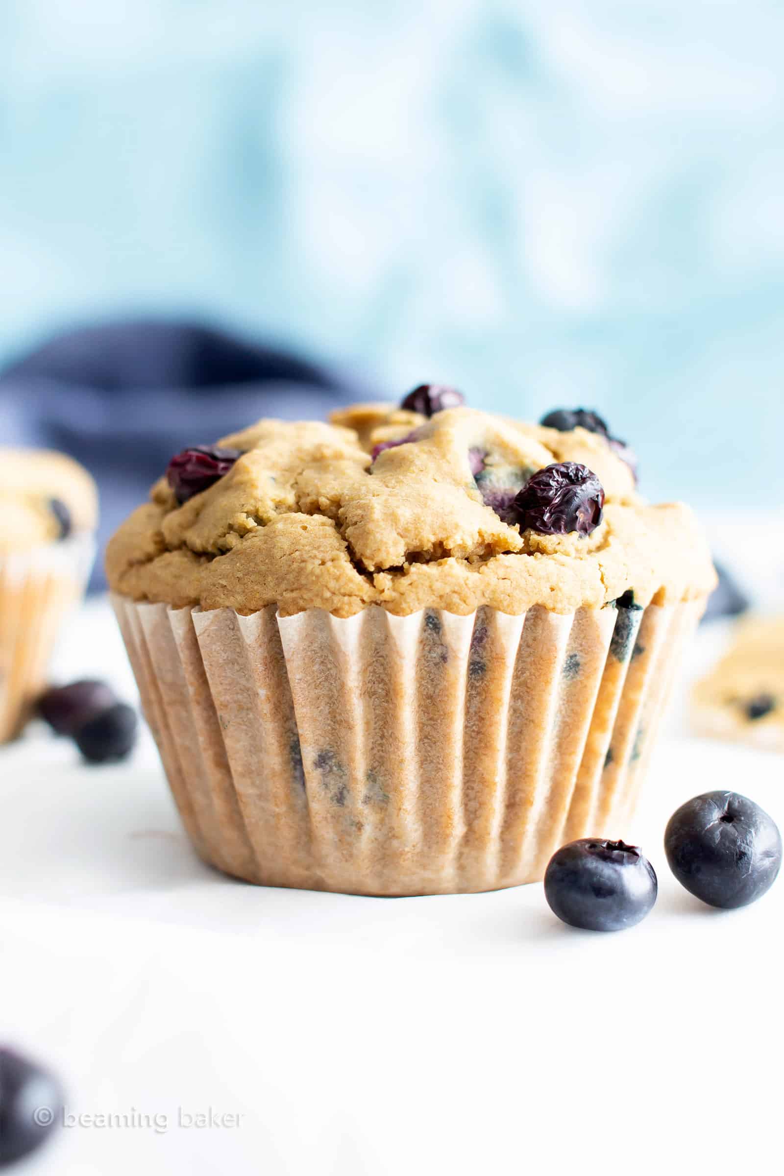 Healthy Vegan Gluten Free Blueberry Muffins: my favorite vegan gluten free blueberry muffins are easy ‘n moist! The best healthy blueberry muffin recipe—made with oat flour and healthy ingredients! #Healthy #Muffins #Vegan #GlutenFree #Blueberry | Recipe at BeamingBaker.com