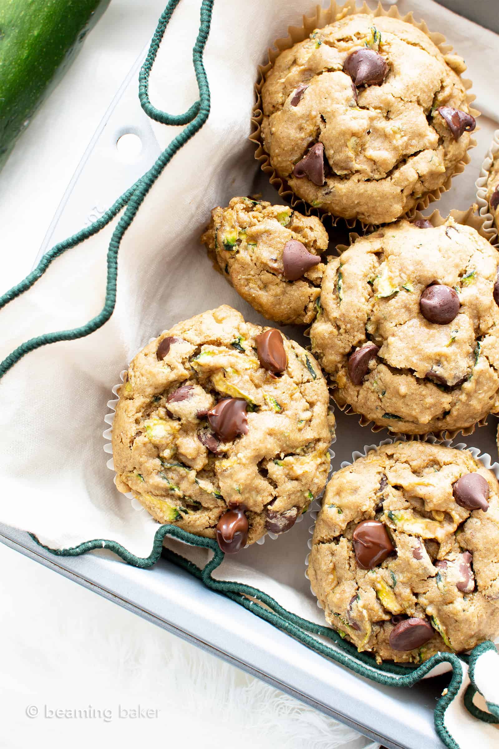 Vegan Zucchini Muffins (Gluten Free): deliciously moist vegan zucchini muffins that are buttery ‘n fluffy! The best gluten free zucchini muffins—egg-free & delicious. #Vegan #GlutenFree #Zucchini #Muffins | Recipe at BeamingBaker.com