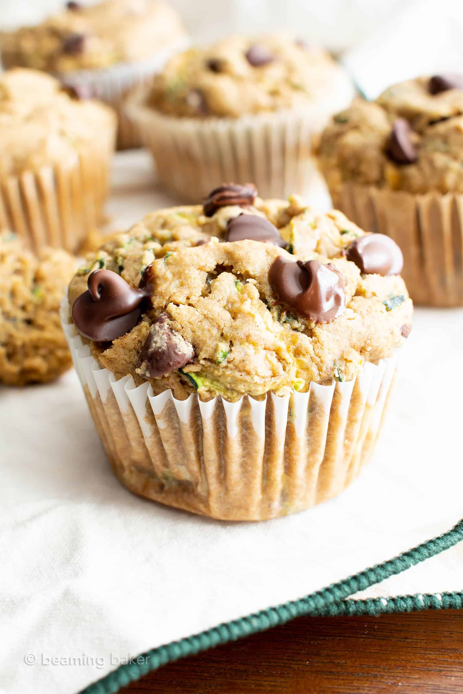 Vegan Zucchini Muffins (Gluten Free): deliciously moist vegan zucchini muffins that are buttery ‘n fluffy! The best gluten free zucchini muffins—egg-free & delicious. #Vegan #GlutenFree #Zucchini #Muffins | Recipe at BeamingBaker.com