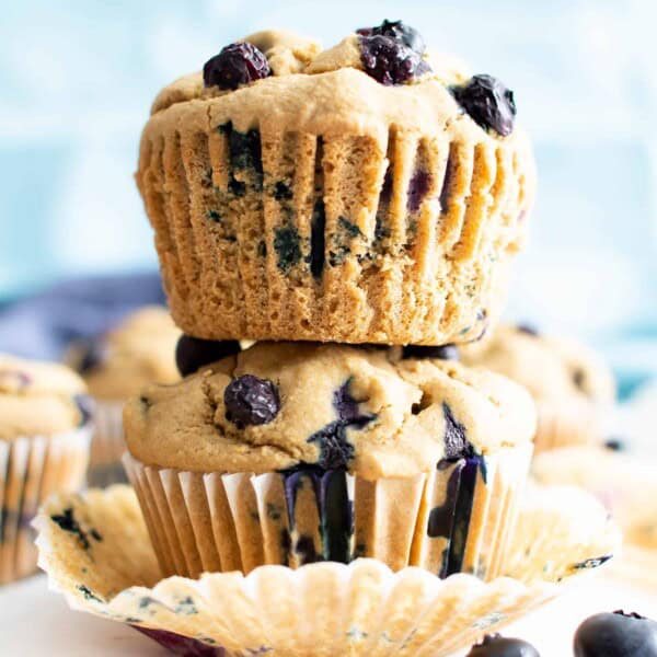 Healthy Vegan Gluten Free Blueberry Muffins: my favorite vegan gluten free blueberry muffins are easy ‘n moist! The best healthy blueberry muffin recipe—made with oat flour and healthy ingredients! #Healthy #Muffins #Vegan #GlutenFree #Blueberry | Recipe at BeamingBaker.com