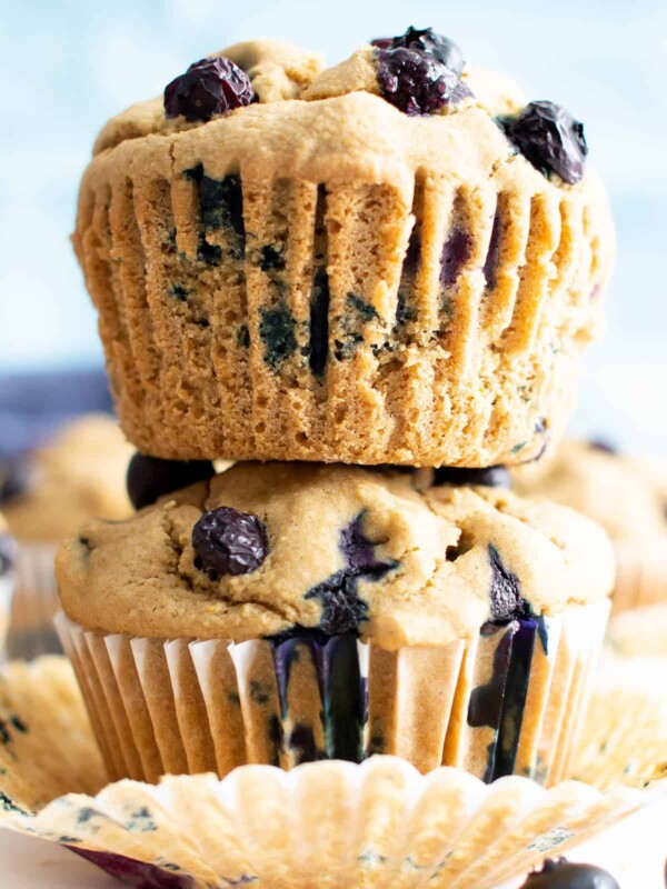 Healthy Vegan Gluten Free Blueberry Muffins: my favorite vegan gluten free blueberry muffins are easy ‘n moist! The best healthy blueberry muffin recipe—made with oat flour and healthy ingredients! #Healthy #Muffins #Vegan #GlutenFree #Blueberry | Recipe at BeamingBaker.com