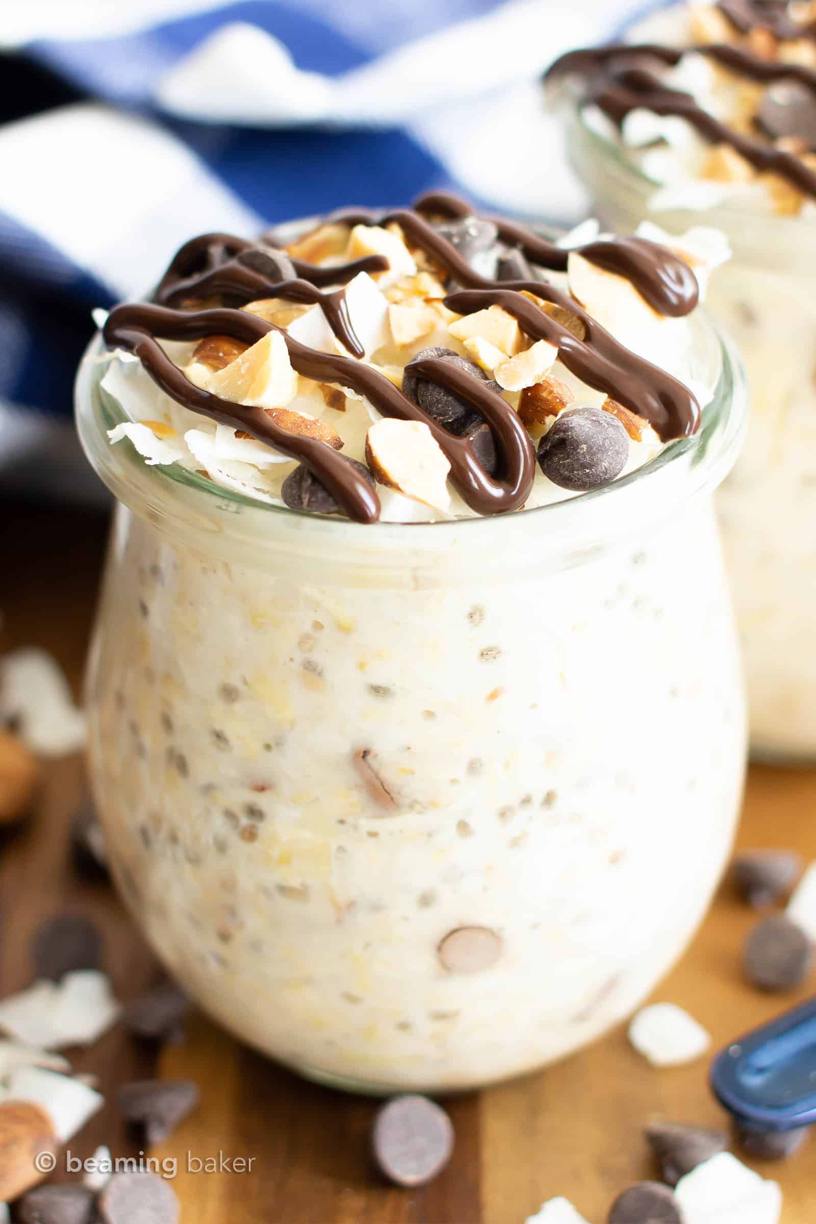 Almond Joy Overnight Oats Recipe (Vegan, GF): super EASY vegan overnight oats that are dessert for breakfast! Tasty vegan overnight oatmeal bursting with almonds, chocolate & coconut goodness. Healthy, Gluten Free, Dairy-Free. #OvernightOats #OvernightOatmeal #Vegan #Breakfast #Healthy | Recipe at BeamingBaker.com