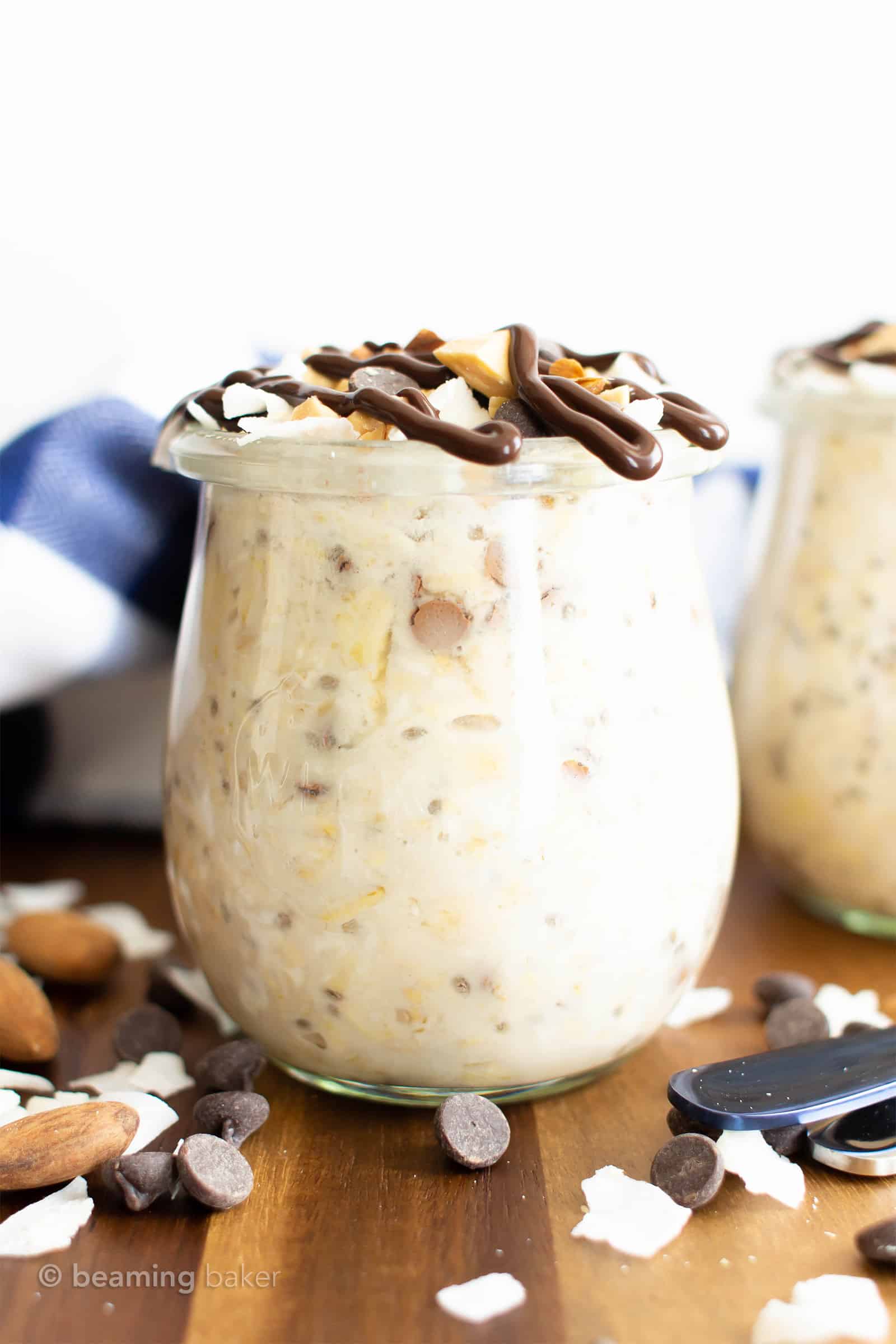 Almond Joy Overnight Oats Recipe (Vegan, GF):  super EASY vegan overnight oats that are dessert for breakfast! Tasty vegan overnight oatmeal bursting with almonds, chocolate & coconut goodness. Healthy, Gluten Free, Dairy-Free. #OvernightOats #OvernightOatmeal #Vegan #Breakfast #Healthy | Recipe at BeamingBaker.com