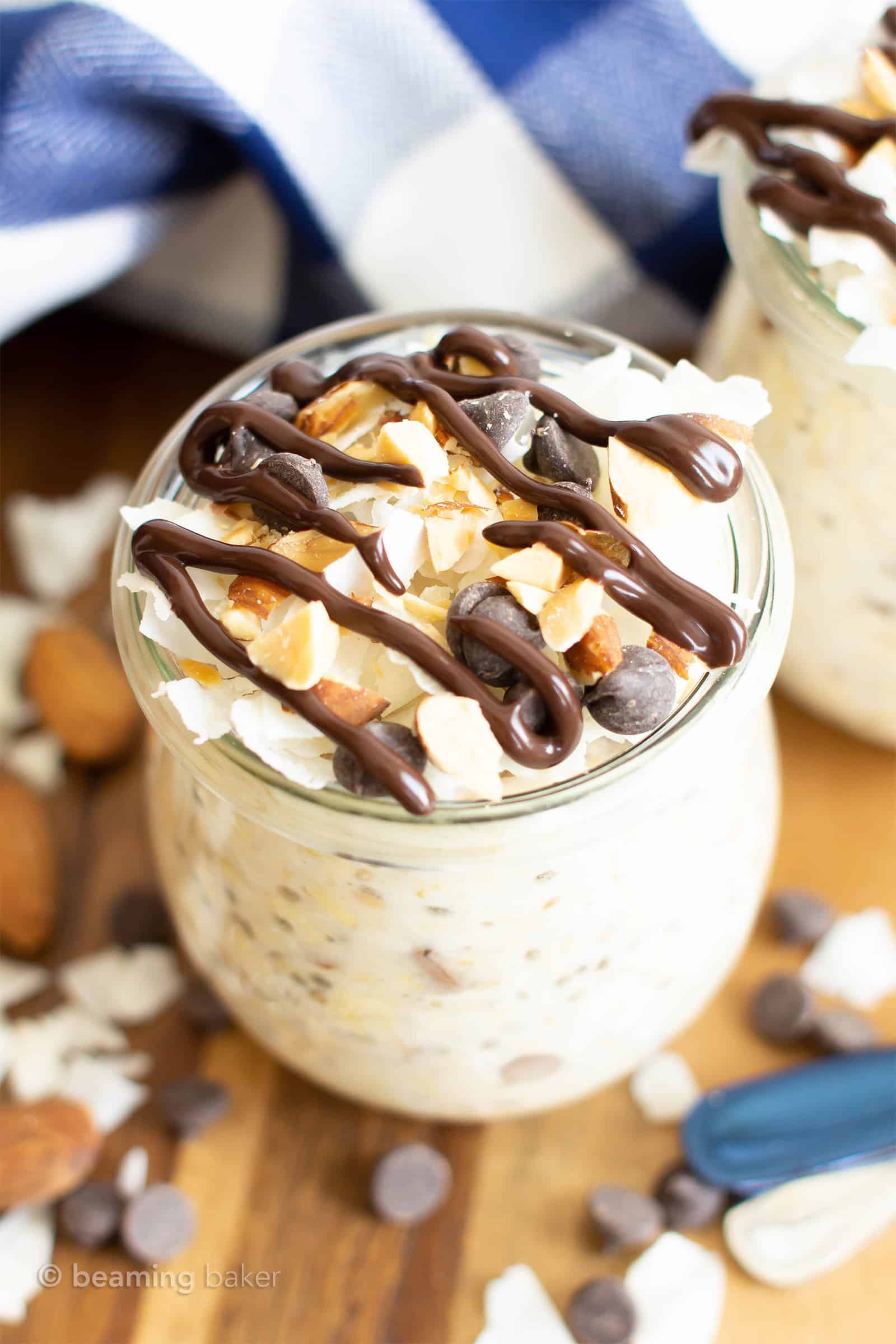 Almond Joy Overnight Oats Recipe (Vegan, GF):  super EASY vegan overnight oats that are dessert for breakfast! Tasty vegan overnight oatmeal bursting with almonds, chocolate & coconut goodness. Healthy, Gluten Free, Dairy-Free. #OvernightOats #OvernightOatmeal #Vegan #Breakfast #Healthy | Recipe at BeamingBaker.com