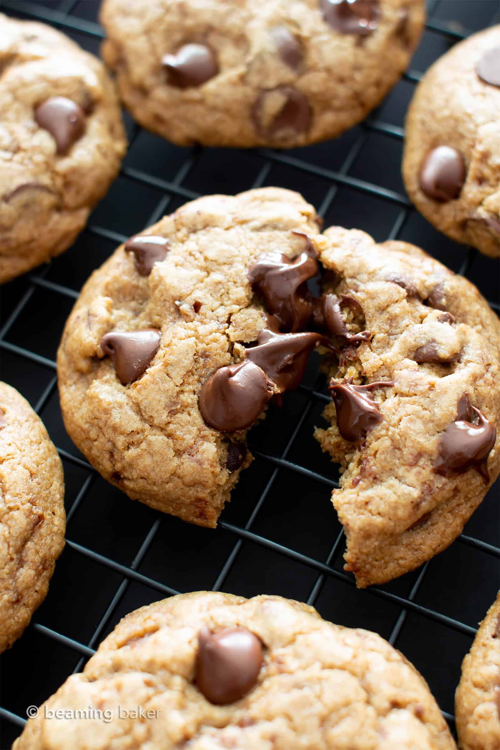 Thick and Chewy Vegan Chocolate Chip Cookies Recipe: the best vegan chocolate chip cookies—gluten free, delicious, easy! Thick chocolate chip cookies with crispy edges, chewy, soft centers, bursting with chocolate! #GlutenFree #Vegan #Chocolate #Cookies | Recipe at BeamingBaker.com