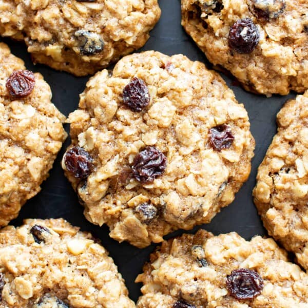 Classic Gluten Free Oatmeal Raisin Cookies (Dairy Free): deliciously chewy gluten free oatmeal raisin cookies with crispy edges and sweet, juicy raisins. Wonderfully gluten and dairy free. #GlutenFree #OatmealRaisin #Cookies #DairyFree | Recipe at BeamingBaker.com 