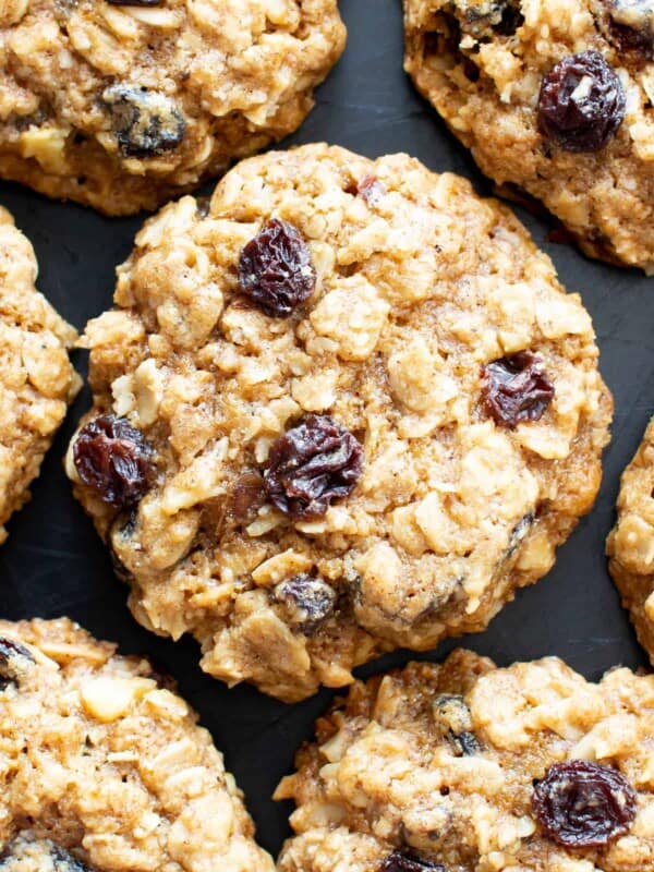 Classic Gluten Free Oatmeal Raisin Cookies (Dairy Free): deliciously chewy gluten free oatmeal raisin cookies with crispy edges and sweet, juicy raisins. Wonderfully gluten and dairy free. #GlutenFree #OatmealRaisin #Cookies #DairyFree | Recipe at BeamingBaker.com 