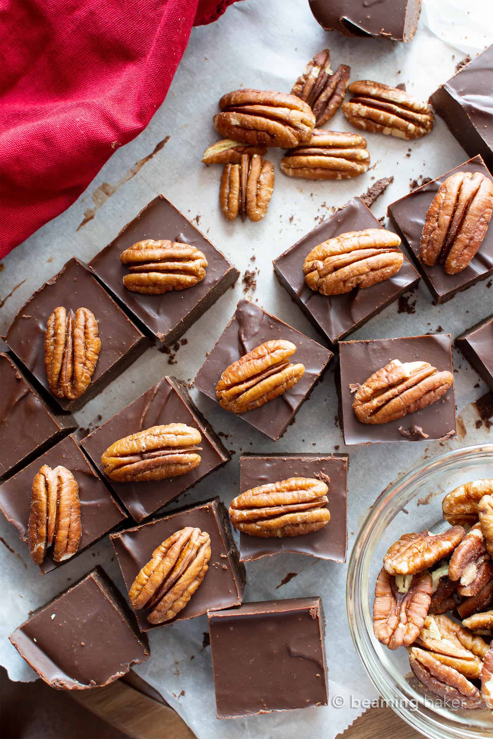 Keto Chocolate Fudge: this low carb chocolate pecan fudge recipe only needs 2 ingredients, is vegan & dairy free! The best 5 minute fudge—for thick squares of sugar free chocolate fudge! Tastes like chocolate covered pecans. #Keto #Fudge #Vegan #LowCarb #SugarFree | Recipe at BeamingBaker.com