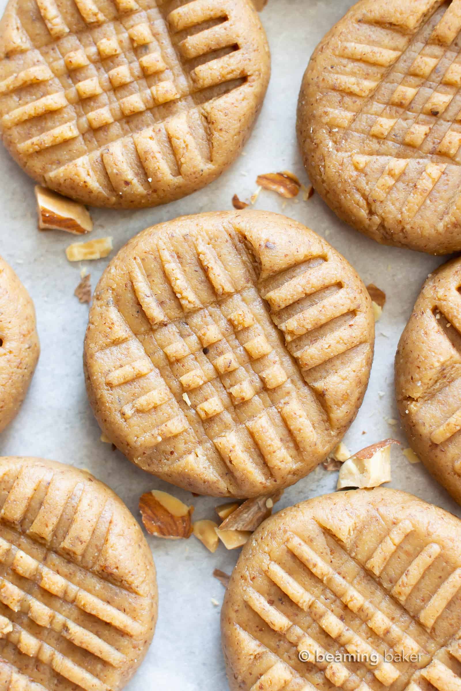 3 Ingredient Almond Butter Paleo No Bake Cookies (GF): learn how to make easy no bake cookies paleo, vegan & gluten free! Soft, sweet & satisfying. Protein-Rich! Refined Sugar-Free. #NoBake #Cookies #Paleo #GlutenFree #Vegan | Recipe at BeamingBaker.com