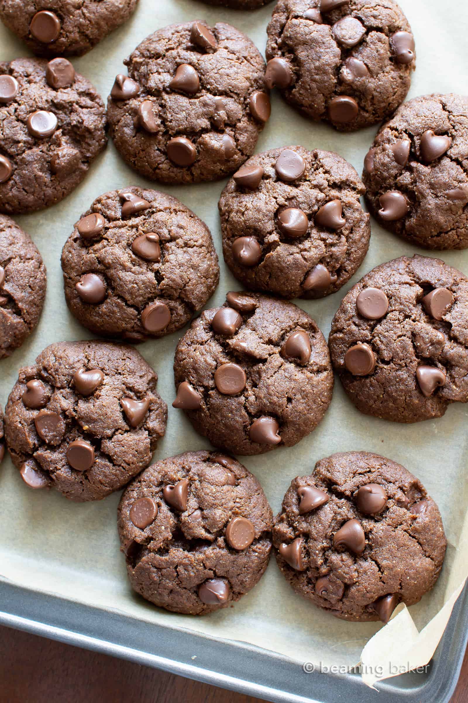 Chewy Gluten Free Chocolate Tahini Cookies (Vegan, GF): this flourless chocolate chip cookie recipe is Paleo! The best double chocolate chip cookies—deliciously chewy & decadent. #GlutenFree #Tahini #Vegan #Paleo #Flourless #Cookies | Recipe at BeamingBaker.com
