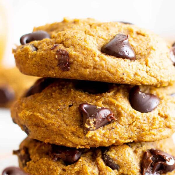 Gluten Free Pumpkin Cookies (Vegan): soft ‘n fluffy gluten free pumpkin cookies bursting with chocolate chips! An easy recipe for moist, cake-like vegan gluten free pumpkin cookies with warm fall spices. #GlutenFree #Pumpkin #Cookies #Vegan | Recipe at BeamingBaker.com 