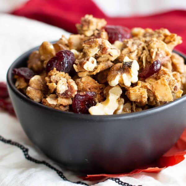 Cranberry Walnut Granola (GF): my favorite GRAINLESS granola—deliciously maple-sweetened crispy, crunchy clusters with tart cranberries & satisfying walnuts! The ultimate homemade GRAIN FREE granola recipe: 10 min prep, Paleo, Vegan, Gluten Free. #GrainFree #Granola #Paleo #Cranberry #GlutenFree | Recipe at BeamingBaker.com