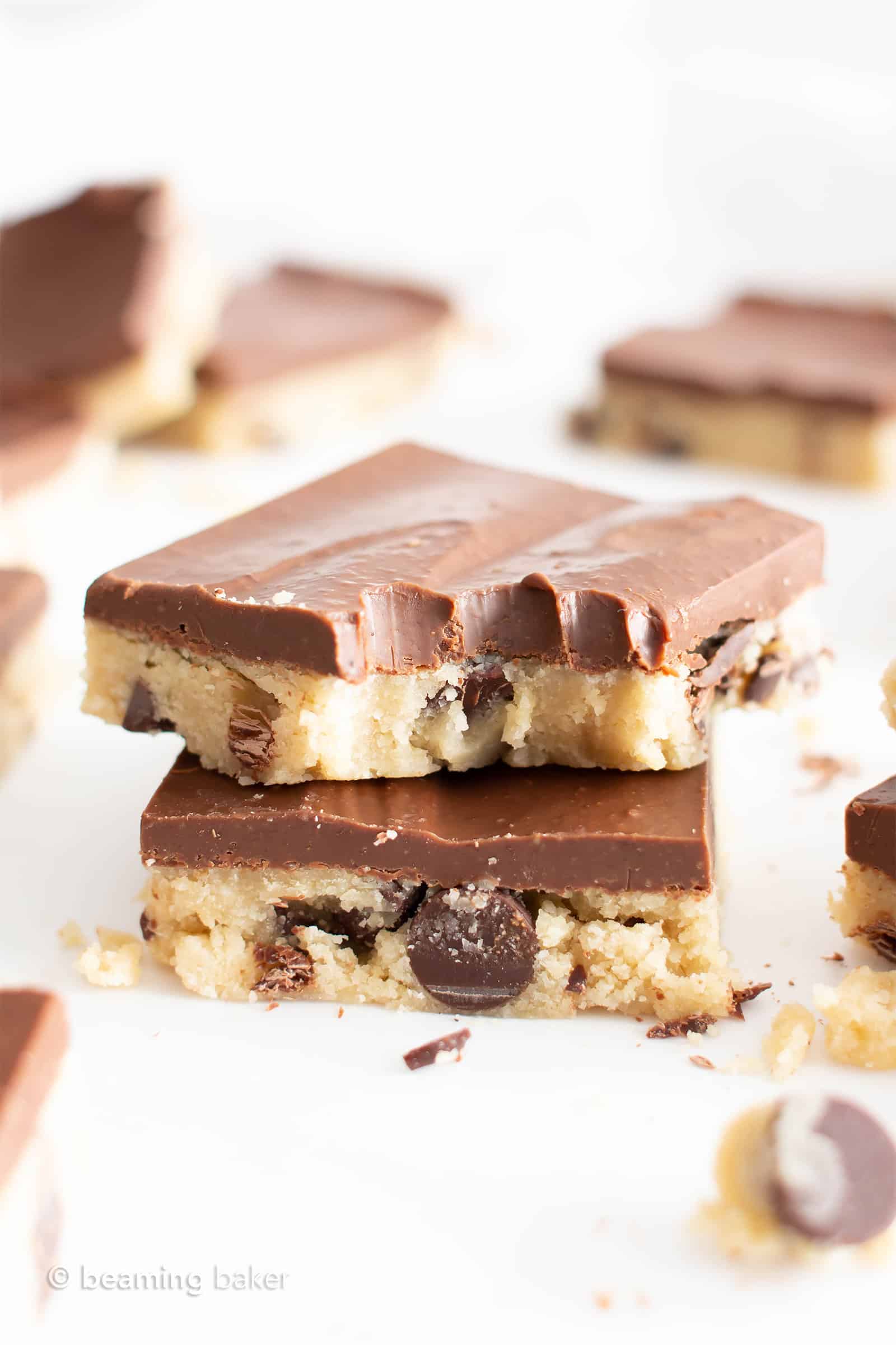 Paleo Cookie Dough Bars (GF): this almond flour cookie dough recipe is delicious & gluten free! Safe to eat & edible, no need to bake. Egg-Free, Vegan, Dairy-Free, Refined Sugar-Free. #Vegan #Paleo #CookieDough #Chocolate | Recipe at BeamingBaker.com