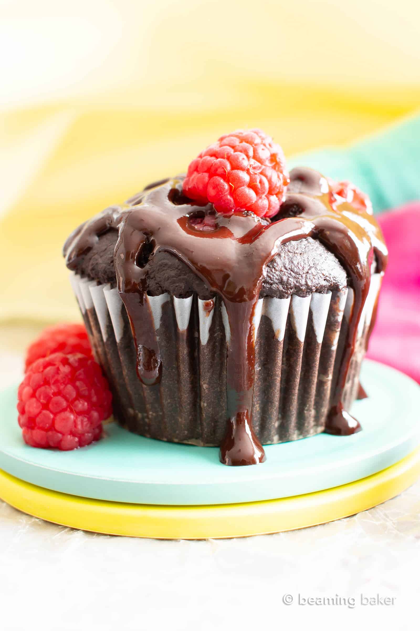 Vegan Dark Chocolate Raspberry Mocha Muffins (GF): decadent, rich, dark chocolate vegan muffins packed with juicy, fresh raspberries, gooey chocolate chips & a coffee kick! #Vegan #Muffins #GlutenFree #Raspberries #DairyFree | Recipe at BeamingBaker.com