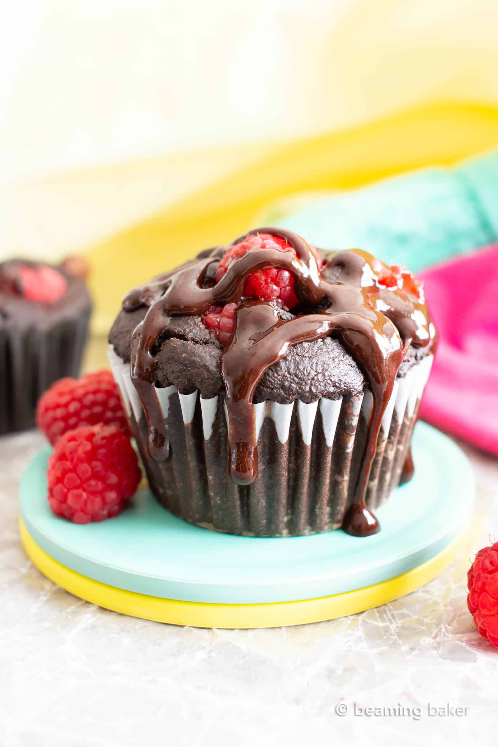 Vegan Dark Chocolate Raspberry Mocha Muffins (GF): decadent, rich, dark chocolate vegan muffins packed with juicy, fresh raspberries, gooey chocolate chips & a coffee kick! #Vegan #Muffins #GlutenFree #Raspberries #DairyFree | Recipe at BeamingBaker.com