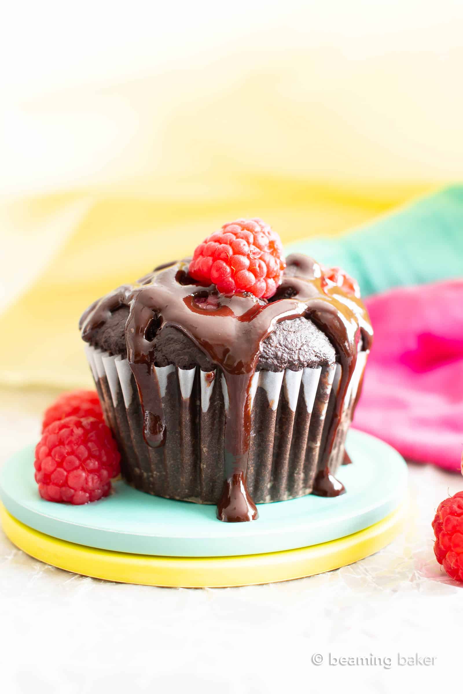 Vegan Dark Chocolate Raspberry Mocha Muffins (GF): decadent, rich, dark chocolate vegan muffins packed with juicy, fresh raspberries, gooey chocolate chips & a coffee kick! #Vegan #Muffins #GlutenFree #Raspberries #DairyFree | Recipe at BeamingBaker.com