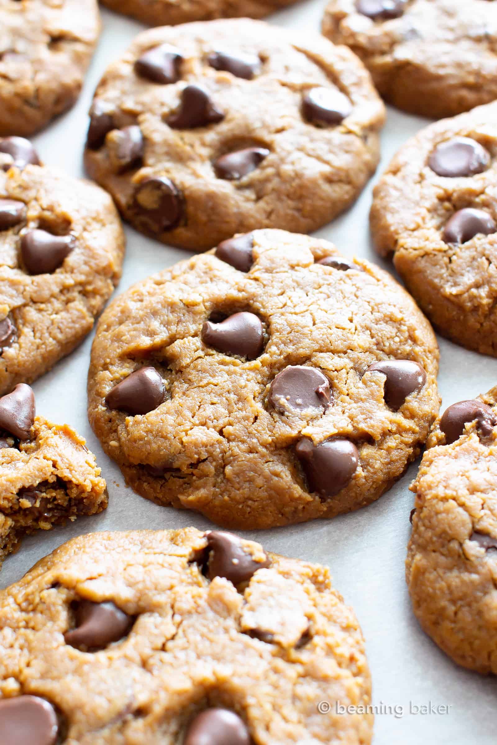 Homemade Cashew Butter Cookies Recipe: easy, melt-in-your-mouth vegan cashew butter cookies made flourless! The BEST Paleo cashew butter cookies—crispy edges, chewy & soft centers, bursting with chocolate. #CashewButter #Paleo #Flourless #Vegan #Cookies | Recipe at BeamingBaker.com