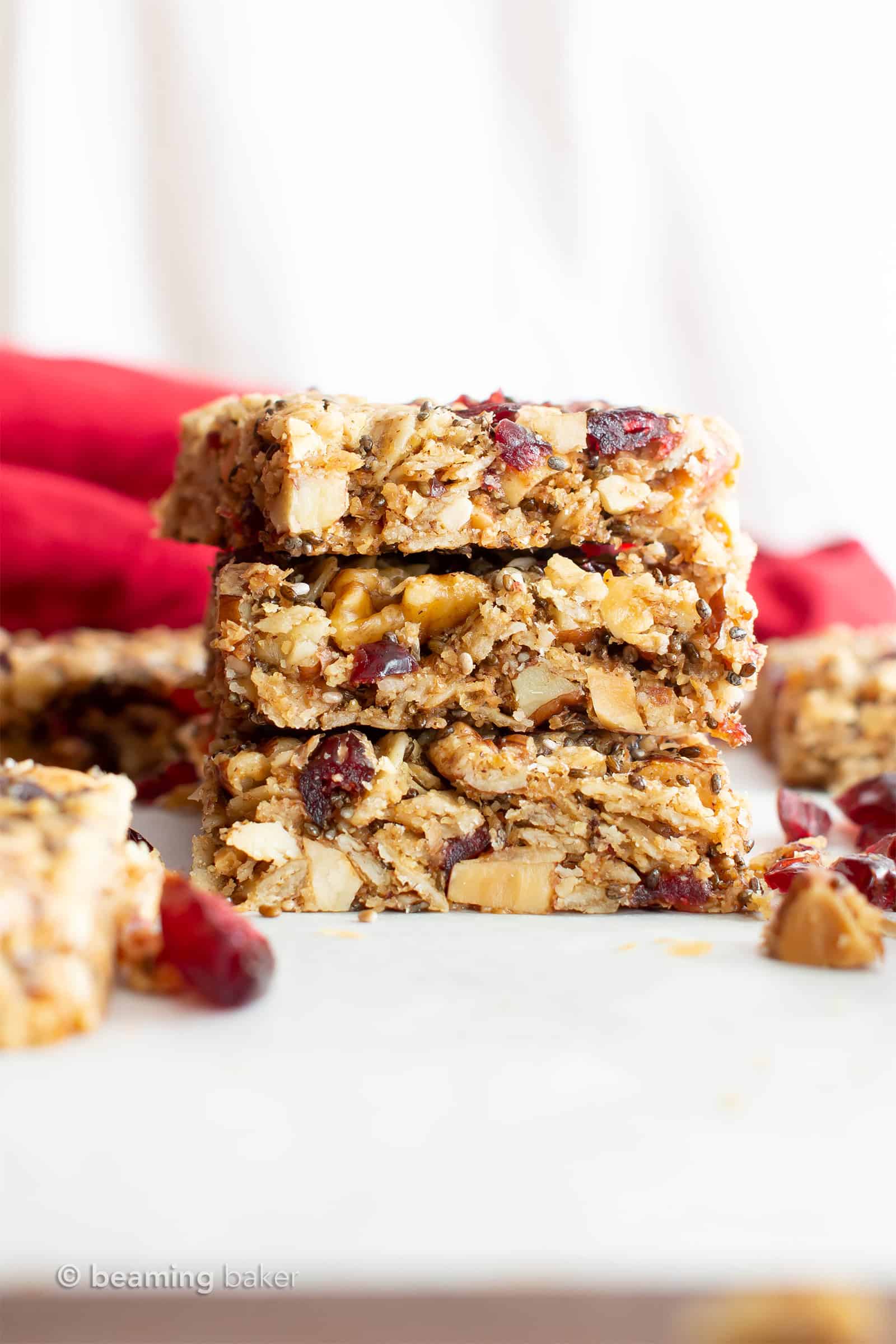 Cranberry Chia Gluten Free Vegan Snack Bars: this healthy vegan snack bars recipe yields chewy & satisfying bars! The best vegan snack bars recipe—packed with chia & flax to keep you full! #Snacks #Bars #GlutenFree #Vegan #Chia | Recipe at BeamingBaker.com