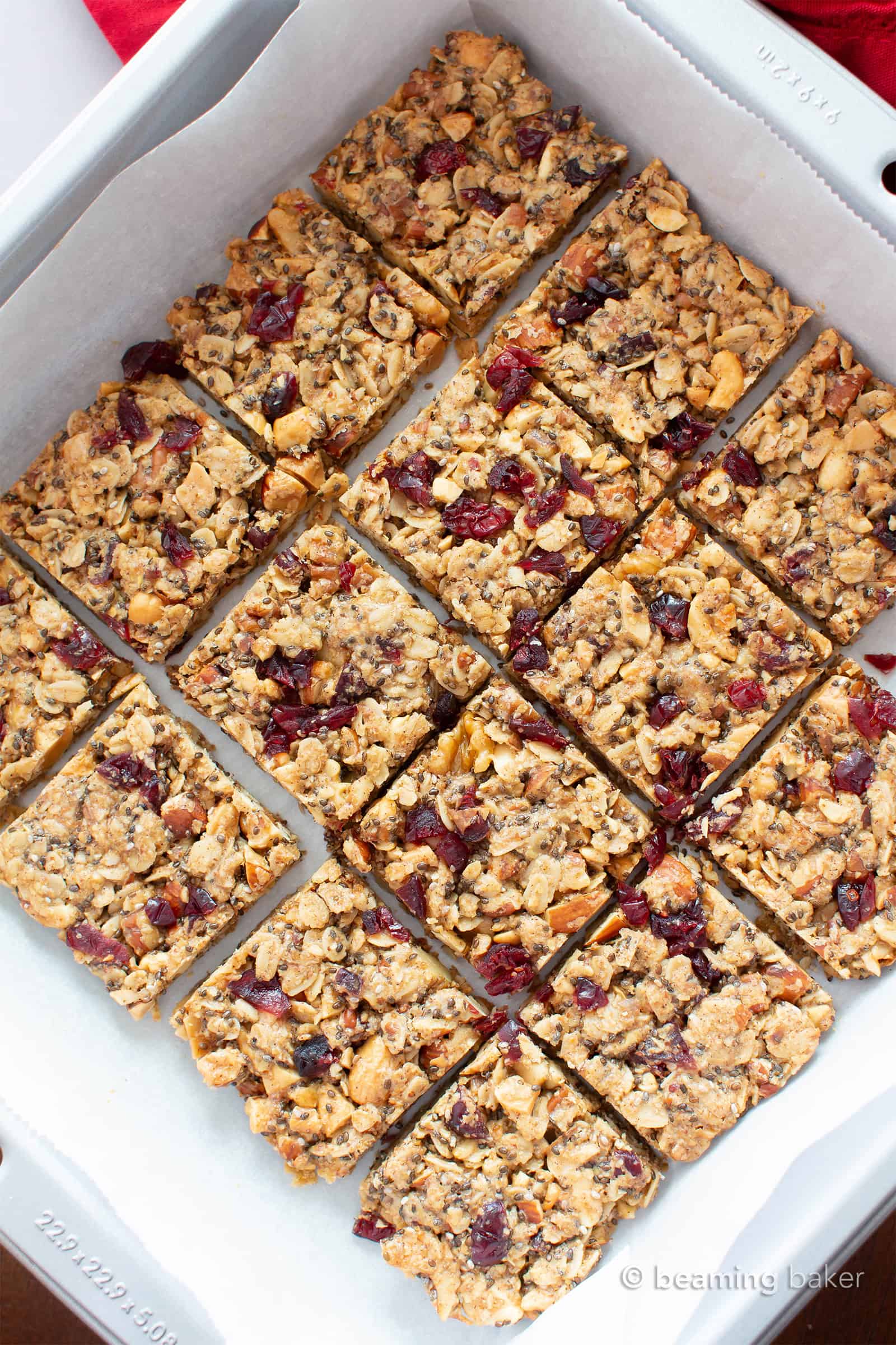 Cranberry Chia Gluten Free Vegan Snack Bars: this healthy vegan snack bars recipe yields chewy & satisfying bars! The best vegan snack bars recipe—packed with chia & flax to keep you full! #Snacks #Bars #GlutenFree #Vegan #Chia | Recipe at BeamingBaker.com