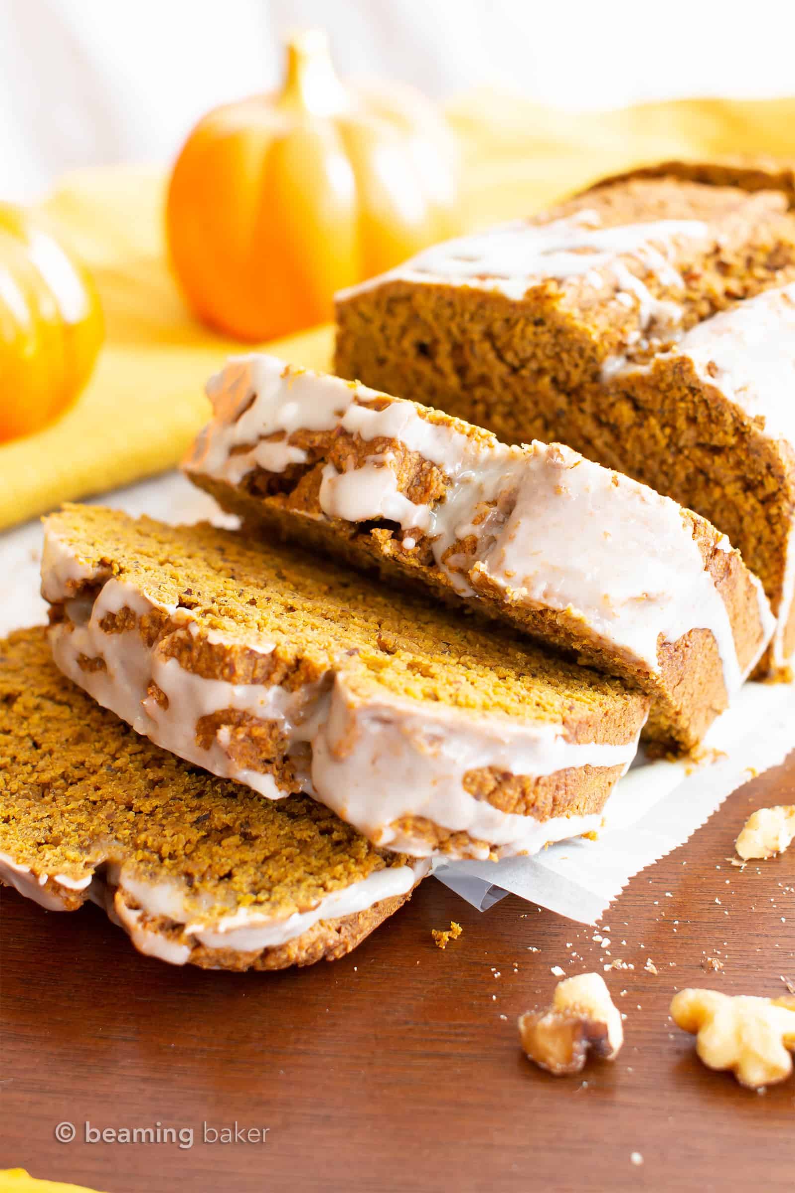 Glazed Vegan Gluten Free Pumpkin Bread Recipe (GF): easy & moist pumpkin bread made in just 1 bowl! The BEST vegan pumpkin bread recipe—flavorful, full of warm spices, made with healthy ingredients and topped with a sweet glaze. #Vegan #Pumpkin #GlutenFree #Bread | Recipe at BeamingBaker.com
