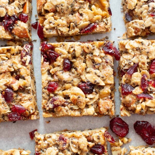 Cranberry Chia Gluten Free Vegan Snack Bars: this healthy vegan snack bars recipe yields chewy & satisfying bars! The best vegan snack bars recipe—packed with chia & flax to keep you full! #Snacks #Bars #GlutenFree #Vegan #Chia | Recipe at BeamingBaker.com