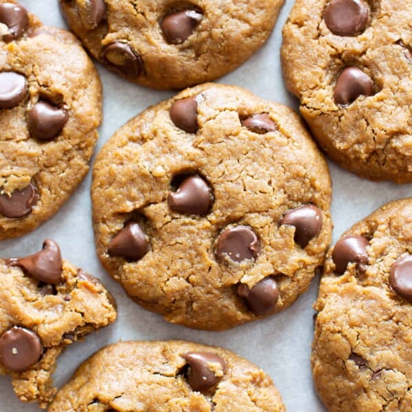 Homemade Cashew Butter Cookies Recipe: easy, melt-in-your-mouth vegan cashew butter cookies made flourless! The BEST Paleo cashew butter cookies—crispy edges, chewy & soft centers, bursting with chocolate. #CashewButter #Paleo #Flourless #Vegan #Cookies | Recipe at BeamingBaker.com