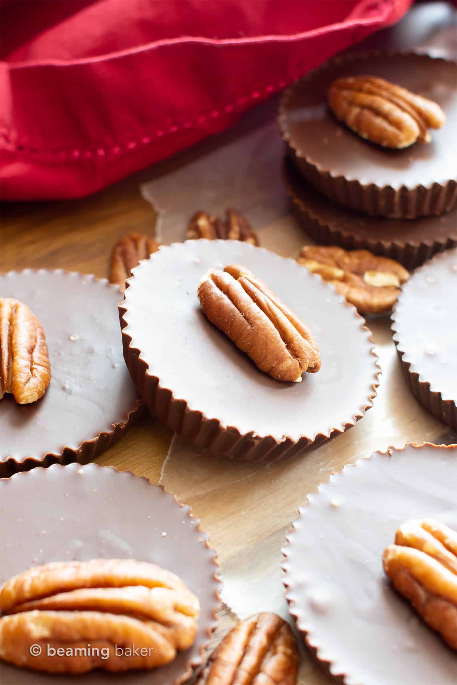 Low Carb Chocolate Fudge Pecan Cups Recipe: just 2 ingredients to make delicious Keto Fudge! Decadent, thick cups of velvety chocolate fudge with sweet pecan flavor. #Keto #LowCarb #SugarFree #Fudge #Vegan | Recipe at BeamingBaker.com