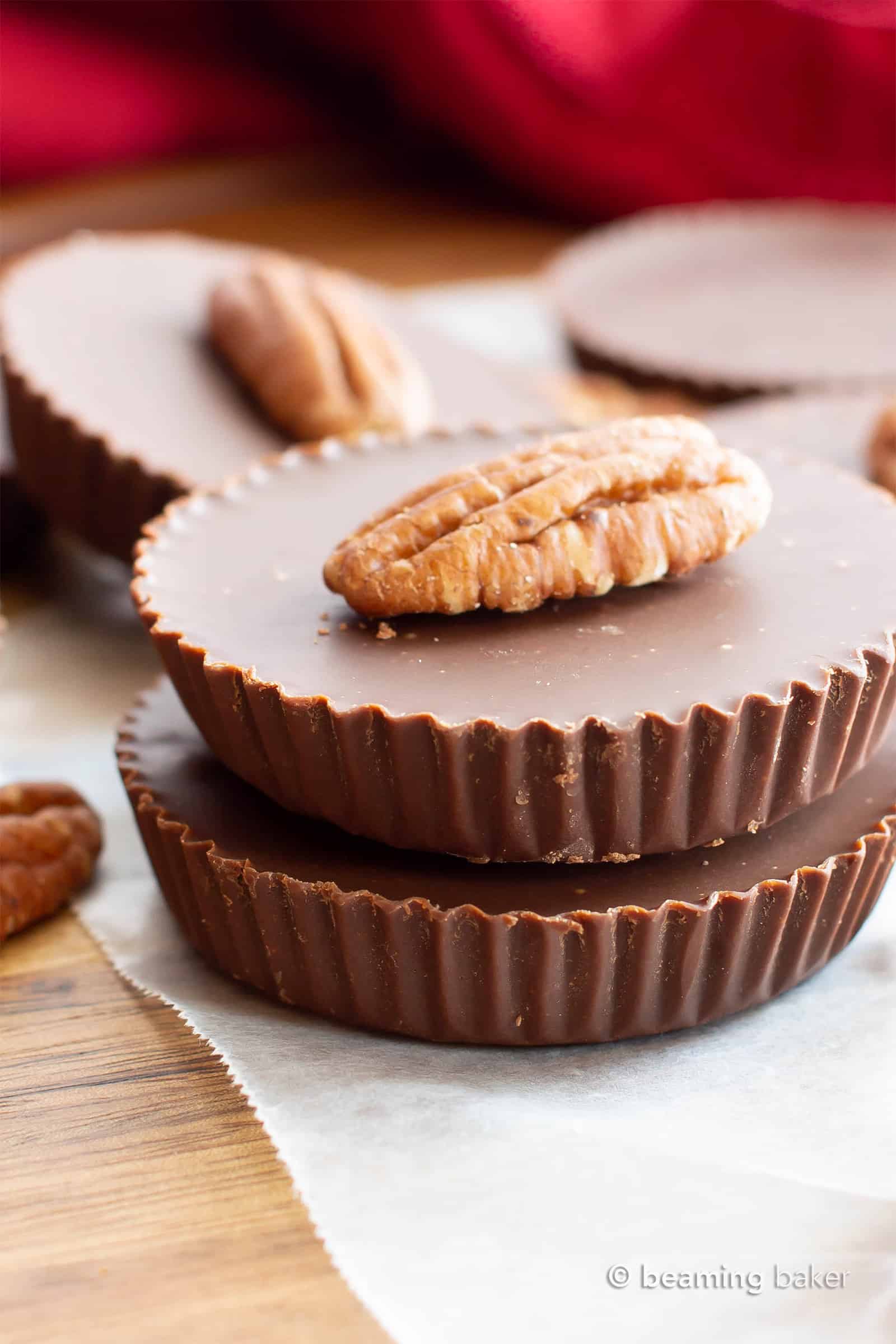 Low Carb Chocolate Fudge Pecan Cups Recipe: just 2 ingredients to make delicious Keto Fudge! Decadent, thick cups of velvety chocolate fudge with sweet pecan flavor. #Keto #LowCarb #SugarFree #Fudge #Vegan | Recipe at BeamingBaker.com