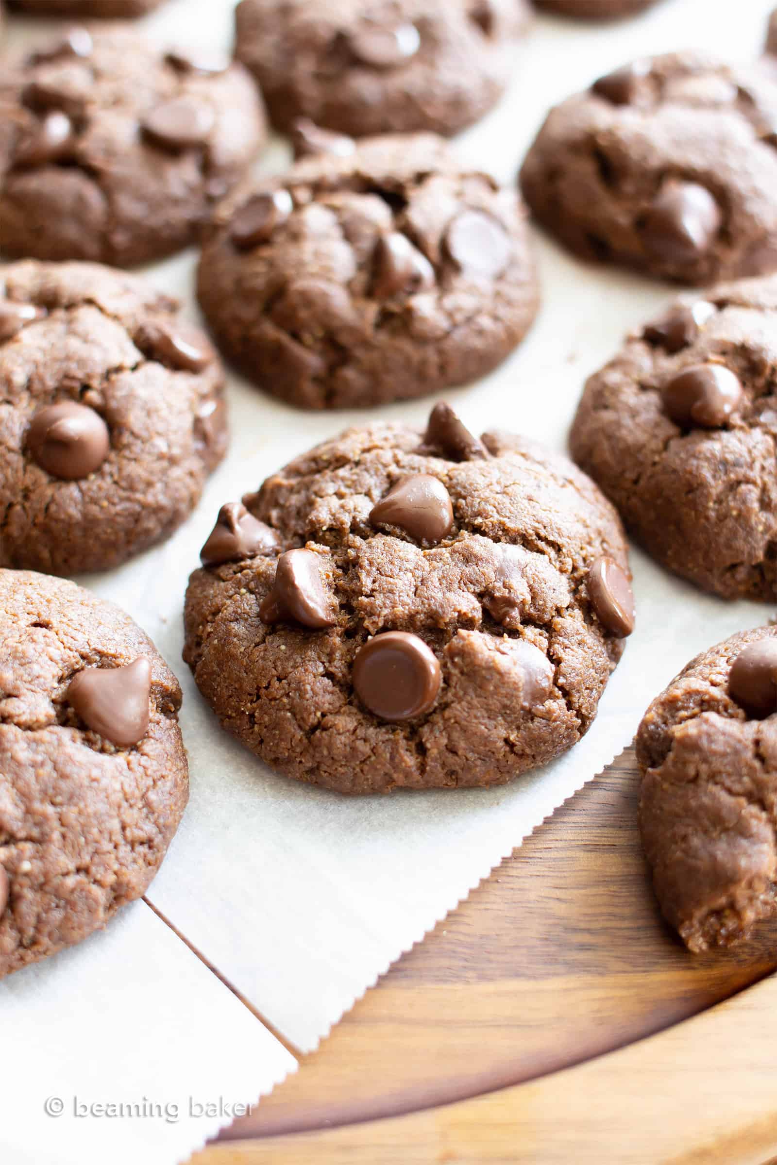 Paleo Vegan Double Chocolate Chip Cookies: the BEST paleo chocolate chip cookies—chewy centers, crispy edges, RICH chocolate flavor. Flourless, Grain-Free, Gluten Free, Dairy-Free. #Paleo #Vegan #Cookies #Chocolate #HealthyDessert | Recipe at BeamingBaker.com