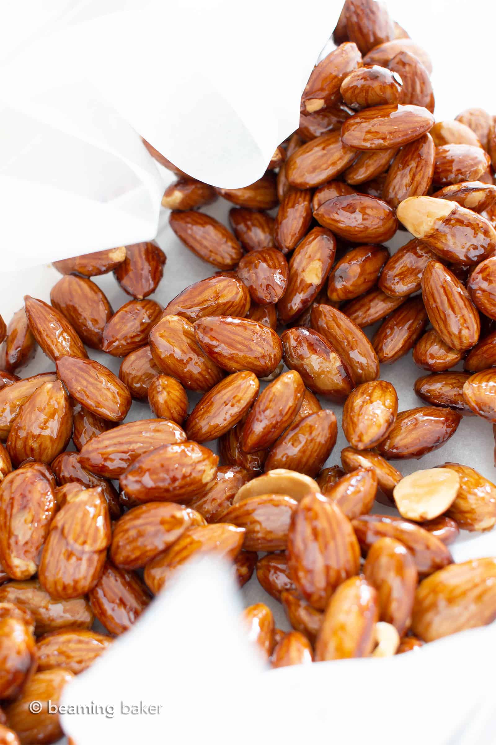 Paleo Candied Almonds: 5-minute stovetop EASY candied almonds recipe! Learn how to make the BEST vegan candied almonds—sweet, healthy & gluten free! #Almonds #Paleo #Vegan #Healthy #Christmas | Recipe at BeamingBaker.com
