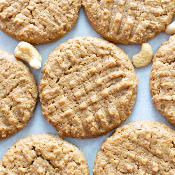 Vegan Cashew Butter Cookies Recipe: just 4 ingredients for super soft, buttery, melt-in-your-mouth Flourless & Paleo Cashew Butter Cookies! Quick & easy, made from healthy ingredients, GF. #CashewButter #Cookies #Paleo #Vegan #Flourless | Recipe at BeamingBaker.com