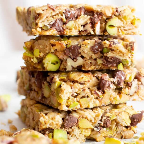 Chocolate Pistachio Healthy Vegan Snack Bars (GF): soft & chewy Gluten Free Vegan snack bars packed with chocolate & pistachios! The perfect nutty snack—easy to make, simple ingredients for the BEST vegan snack bars! Dairy-Free, Refined Sugar-Free. #Snacks #Vegan #GlutenFree #HealthySnacks | Recipe at BeamingBaker.com