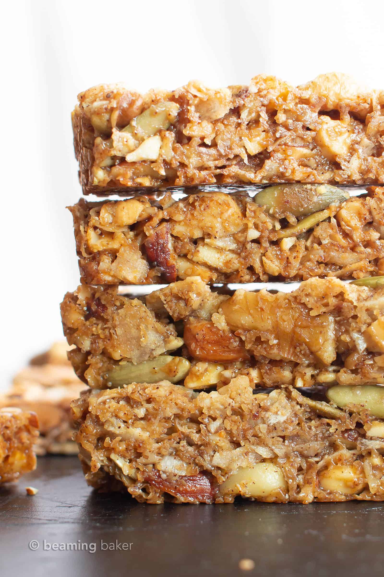 Homemade Paleo Granola Bars (V, GF): the BEST grain free granola bars recipe—chewy & satisfying, packed with nutty crunch and simple, whole ingredients. Gluten Free, Vegan, Paleo, Protein-Rich, Dairy-Free. #Paleo #GrainFree #GranolaBars #Healthy #Snacks | Recipe at BeamingBaker.com