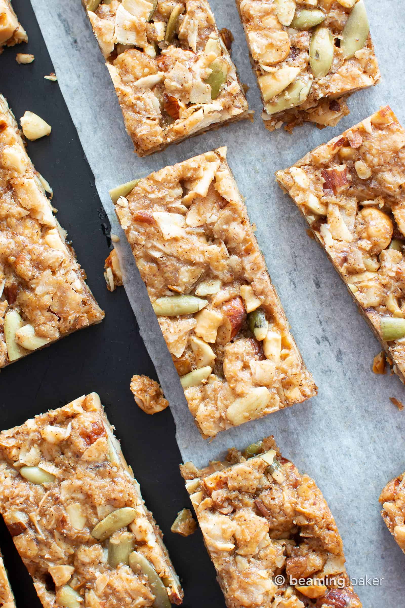 Homemade Paleo Granola Bars (V, GF): the BEST grain free granola bars recipe—chewy & satisfying, packed with nutty crunch and simple, whole ingredients. Gluten Free, Vegan, Paleo, Protein-Rich, Dairy-Free. #Paleo #GrainFree #GranolaBars #Healthy #Snacks | Recipe at BeamingBaker.com