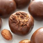 Paleo Energy Balls: just 4 ingredients for delicious, protein-packed healthy Almond Butter Balls—paleo recipe! These no bake energy balls are bursting with chocolate, vegan, gluten-free & dairy-free! #Paleo #Snacks #Vegan #GlutenFree | Recipe at BeamingBaker.com