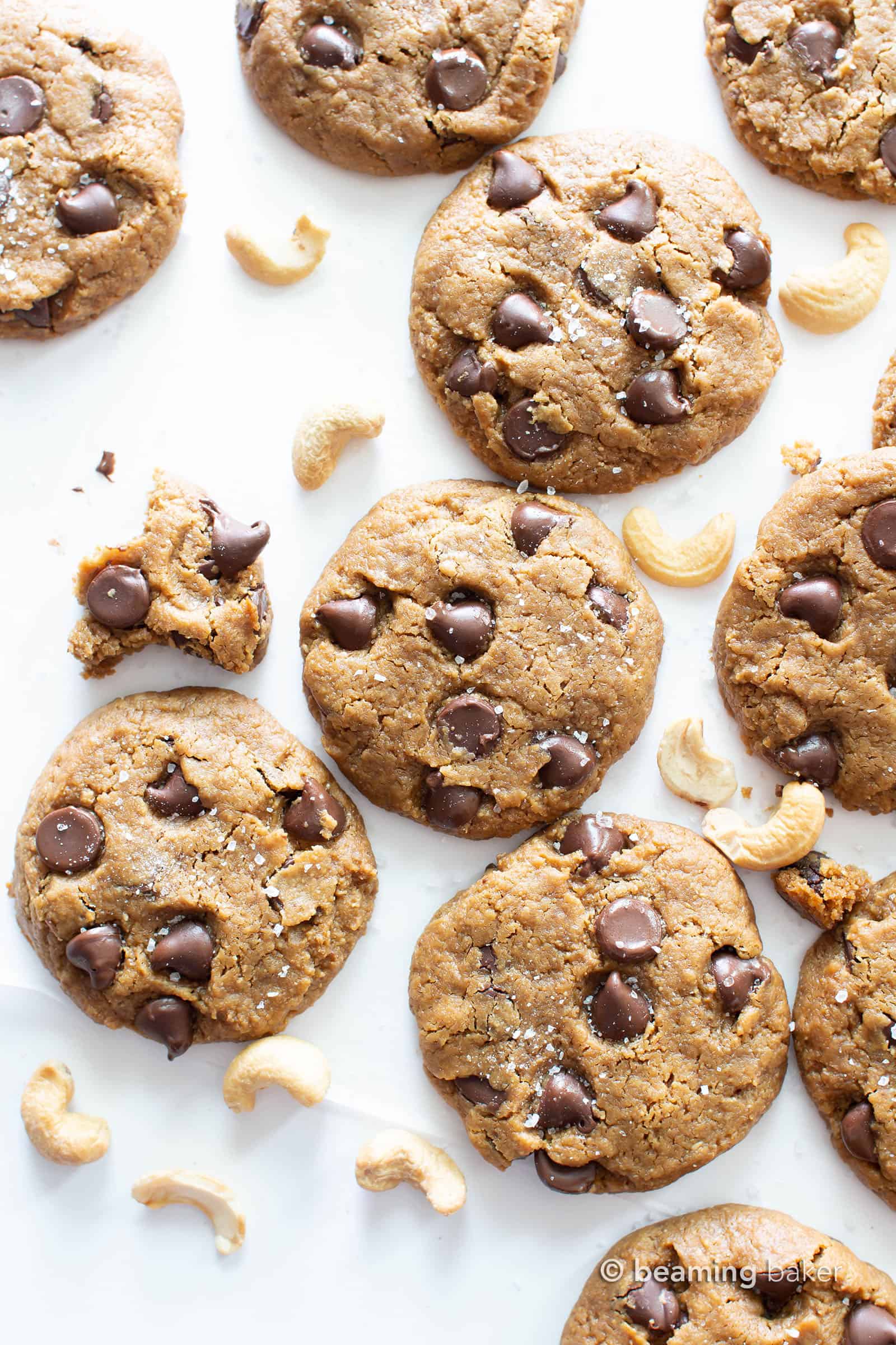 Salted Flourless Cashew Butter Cookies (V, GF): this vegan cashew butter cookies recipe creates soft, decadent flourless cashew butter cookies packed with chocolate & sea salt! #Flourless #CashewButter #Cookies #Vegan | Recipe at BeamingBaker.com