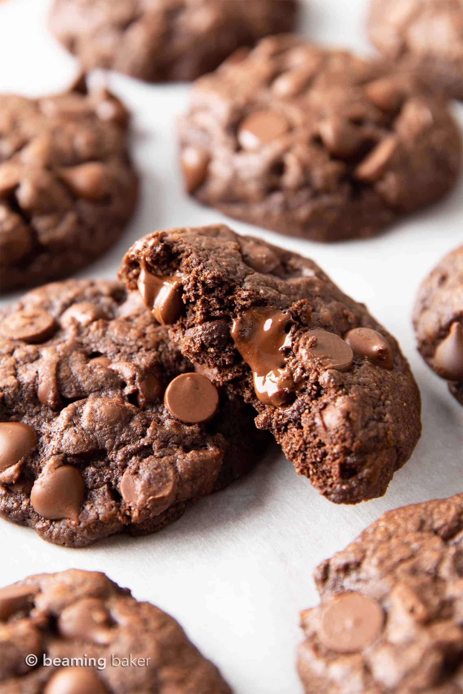 Gluten Free Chocolate Cookies: chewy & moist gluten free brownie cookies with a crispy exterior and LOTS of chocolate packed in! The BEST gluten free chocolate brownie cookie recipe EVER. #Brownies #GlutenFree #Cookies #Vegan | Recipe at BeamingBaker.com