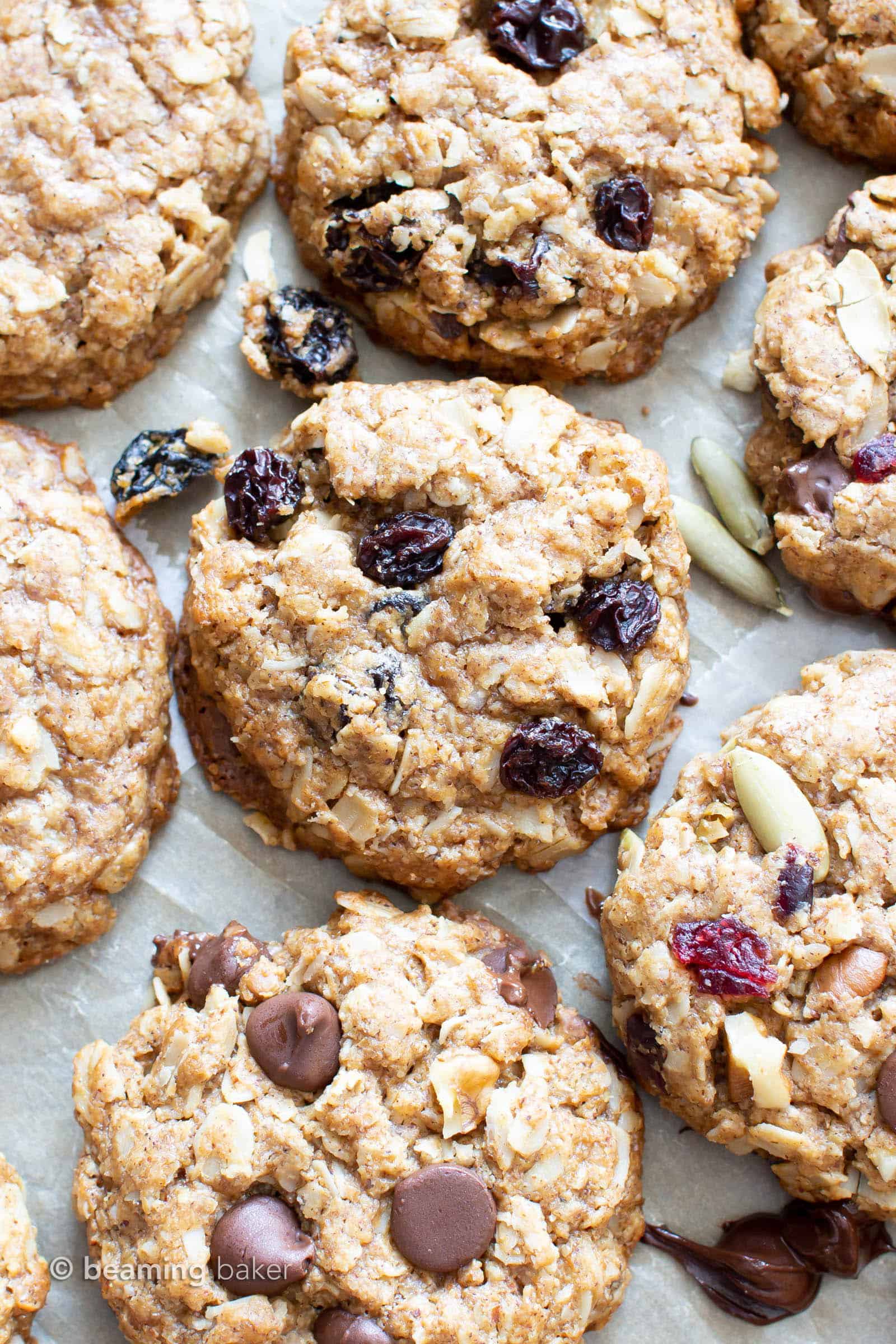 Gluten Free Oatmeal Cookies – 4 Ways: learn how to make the best gluten free oatmeal cookies, 4 yummy ways: Chocolate Chip, Oatmeal Raisin, Trail Mix and Simple & Easy! #GlutenFree #Oatmeal #Cookies #Vegan | Recipe at BeamingBaker.com