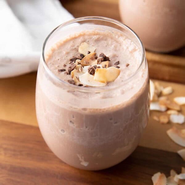 Coconut Chocolate Keto Smoothie: this keto protein smoothie recipe is delicious, easy to make & Low Carb! Just 6 ingredients for 12 grams of protein and only 3 net carbs. #LowCarb #HighProtein #Vegan #Smoothie | Recipe at BeamingBaker.com