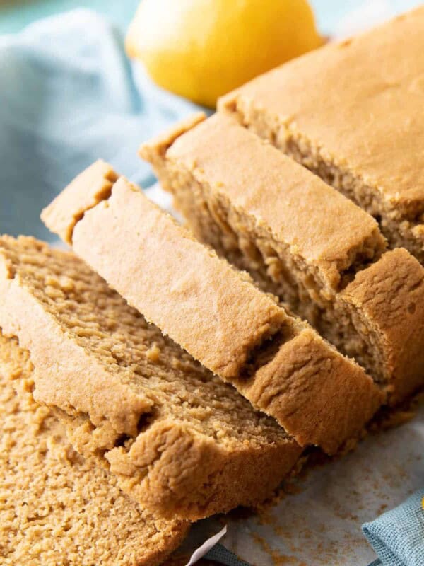 Easy Vegan Lemon Loaf: this dairy free lemon loaf is moist & fluffy, bursting with bright lemon flavor. Easy to make, Plant-Based ingredients, Gluten Free. #Lemon #Vegan #GlutenFree #Healthy | Recipe at BeamingBaker.com