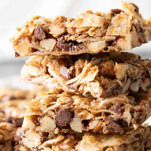 Coconut Granola Bars (Paleo): chewy & healthy homemade granola bars bursting with coconut & nuts! Deliciously healthy granola bars—Paleo, Grain-Free, Vegan, Gluten Free. #GranolaBars #Paleo #Healthy #Vegan | Recipe at BeamingBaker.com