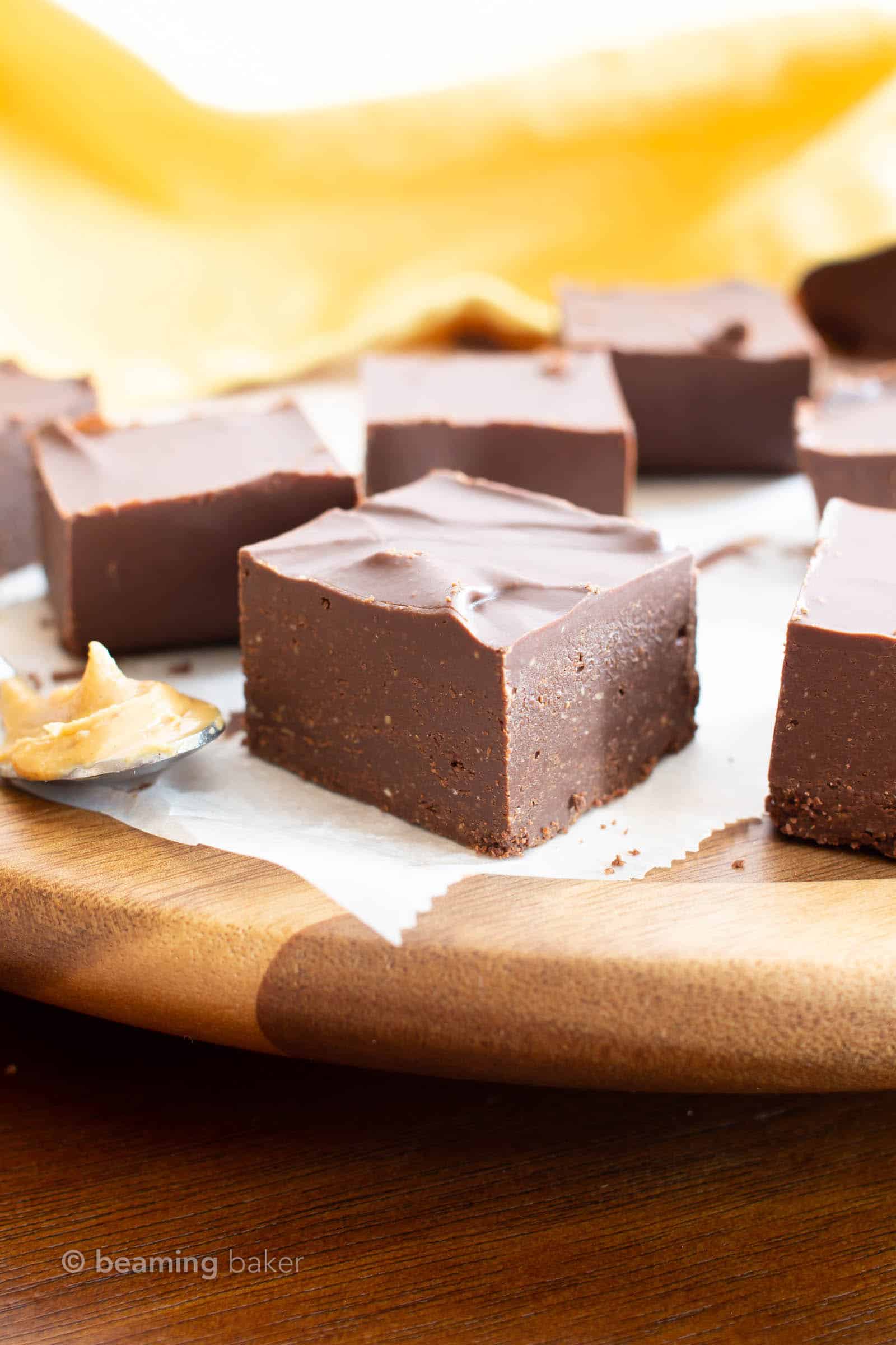 2 Ingredient Keto Chocolate Peanut Butter Fudge: EASY keto fudge recipe prepared in 5 minutes for thick squares of decadent, Low Carb keto chocolate peanut butter fudge. #Keto #LowCarb #PeanutButter #Fudge | Recipe at BeamingBaker.com