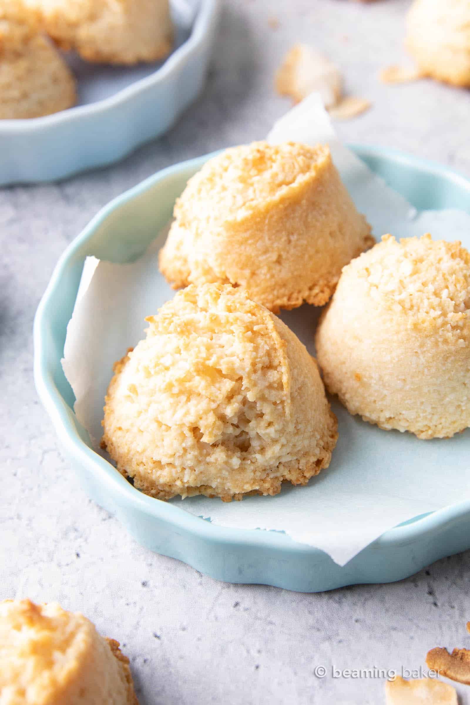 Gluten Free Coconut Macaroons Recipe: this easy gluten free macaroons recipe yields soft & chewy coconut cookies with a crispy exterior! Vegan, Paleo, Dairy-Free, Egg-Free. #Coconut #Macaroons #GlutenFree #Cookies #Easter | Recipe at BeamingBaker.com