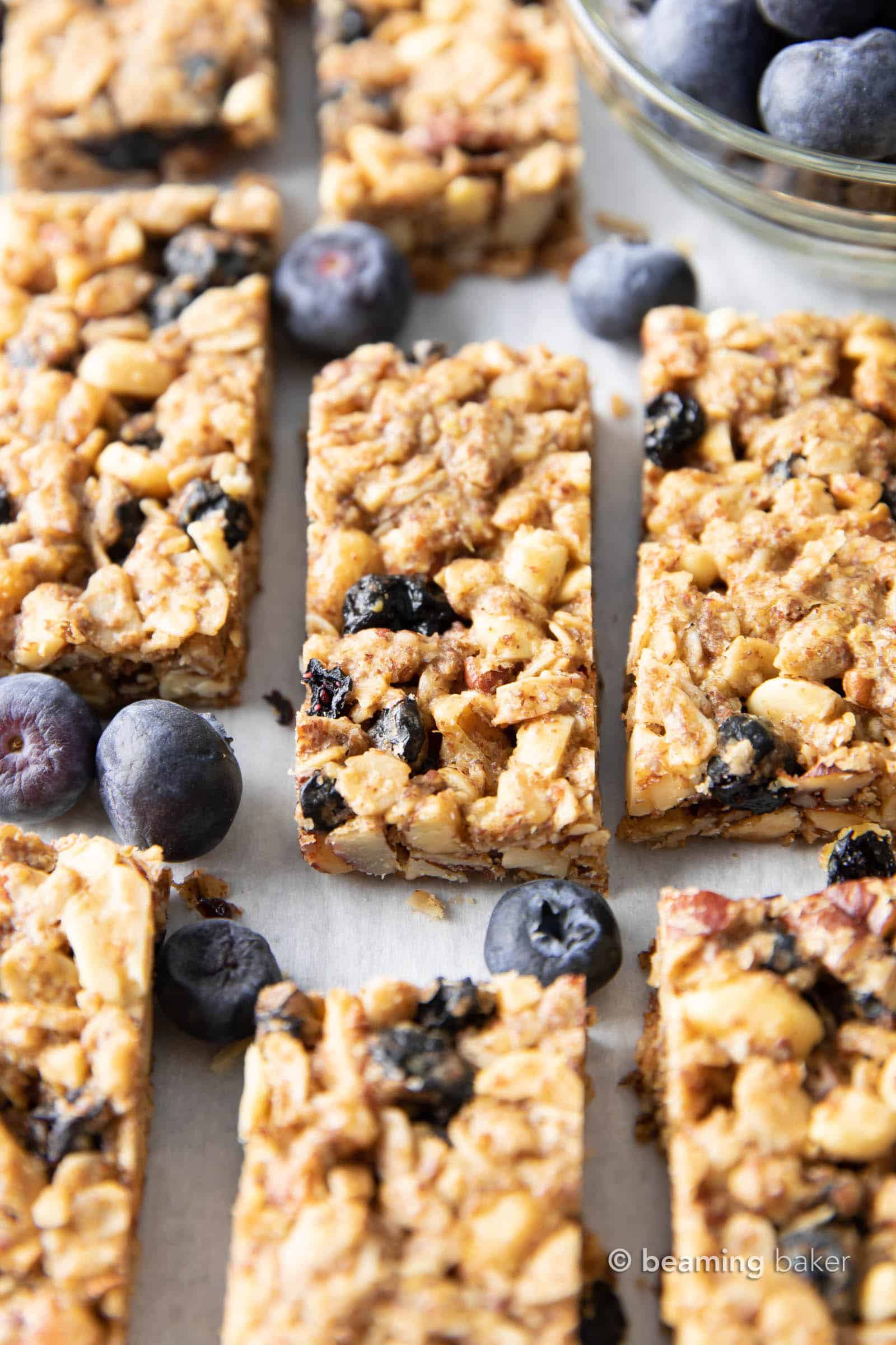 Blueberry Granola Bars (GF): this healthy homemade granola bars recipe is chewy, nutrient-rich & EASY to make! Plant-Based, Refined Sugar-Free, Vegan. #GranolaBars #Blueberry #Healthy #GlutenFree | Recipe at BeamingBaker.com