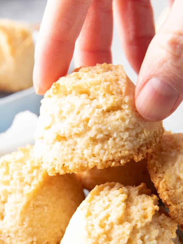 Gluten Free Coconut Macaroons Recipe: this easy gluten free macaroons recipe yields soft & chewy coconut cookies with a crispy exterior! Vegan, Paleo, Dairy-Free, Egg-Free. #Coconut #Macaroons #GlutenFree #Cookies | Recipe at BeamingBaker.com