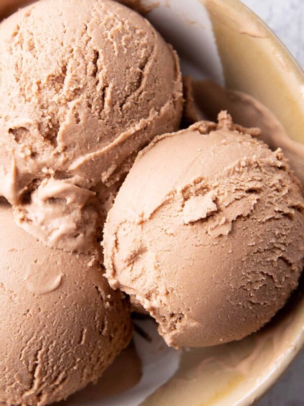 Best Vegan Chocolate Ice Cream Recipe: the BEST vegan chocolate ice cream recipe—rich ‘n creamy, unbelievable deep chocolate flavor and made with simple, whole ingredients. Deliciously decadent and guilt-free vegan chocolate ice cream. Dairy-Free. #Vegan #Chocolate #IceCream #VeganIceCream | Recipe at BeamingBaker.com