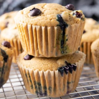 Easy Vegan Blueberry Muffins Recipe: this soft ‘n moist vegan blueberry muffins recipe yields fluffy, bright blueberry muffins. Gluten Free, Dairy-Free. #Vegan #Blueberry #Muffins #GlutenFree | Recipe at BeamingBaker.com