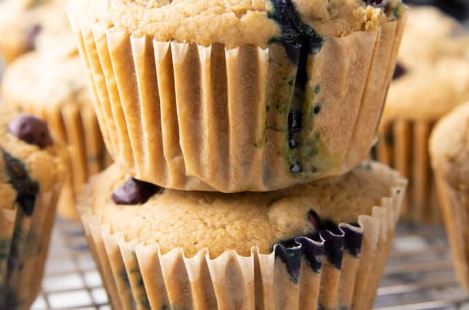 Easy Vegan Blueberry Muffins Recipe: this soft ‘n moist vegan blueberry muffins recipe yields fluffy, bright blueberry muffins. Gluten Free, Dairy-Free. #Vegan #Blueberry #Muffins #GlutenFree | Recipe at BeamingBaker.com